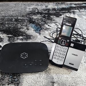 Silver and Black Cordless Phone with Ooma Base
